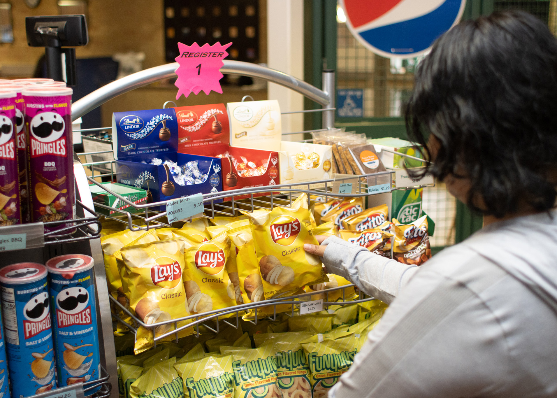 customer looking at snack foods